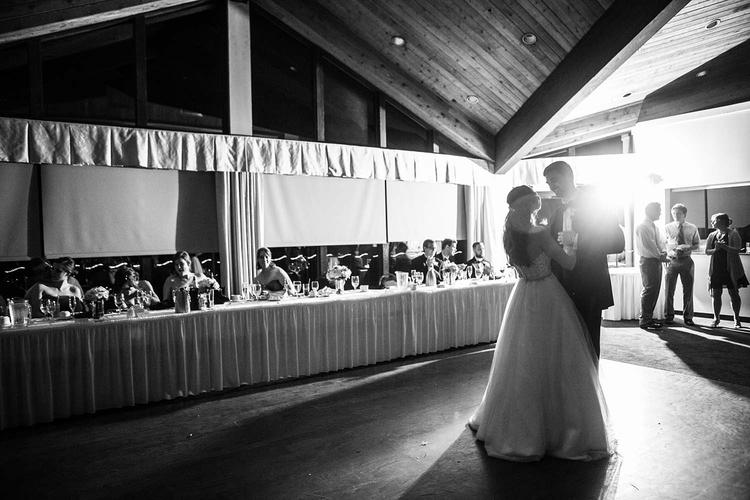 black and white portrait of Newlyweds  first dance. wedding reception at White Pines Golf Club in Park Ridge, Illinois. Saint Paul Wedding Photographer