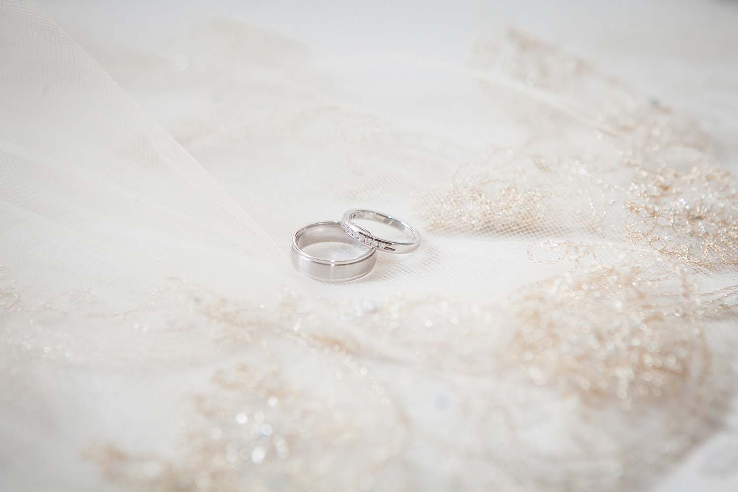classic wedding pillow and wedding ring sets detail. MInnesota Wedding Photographers